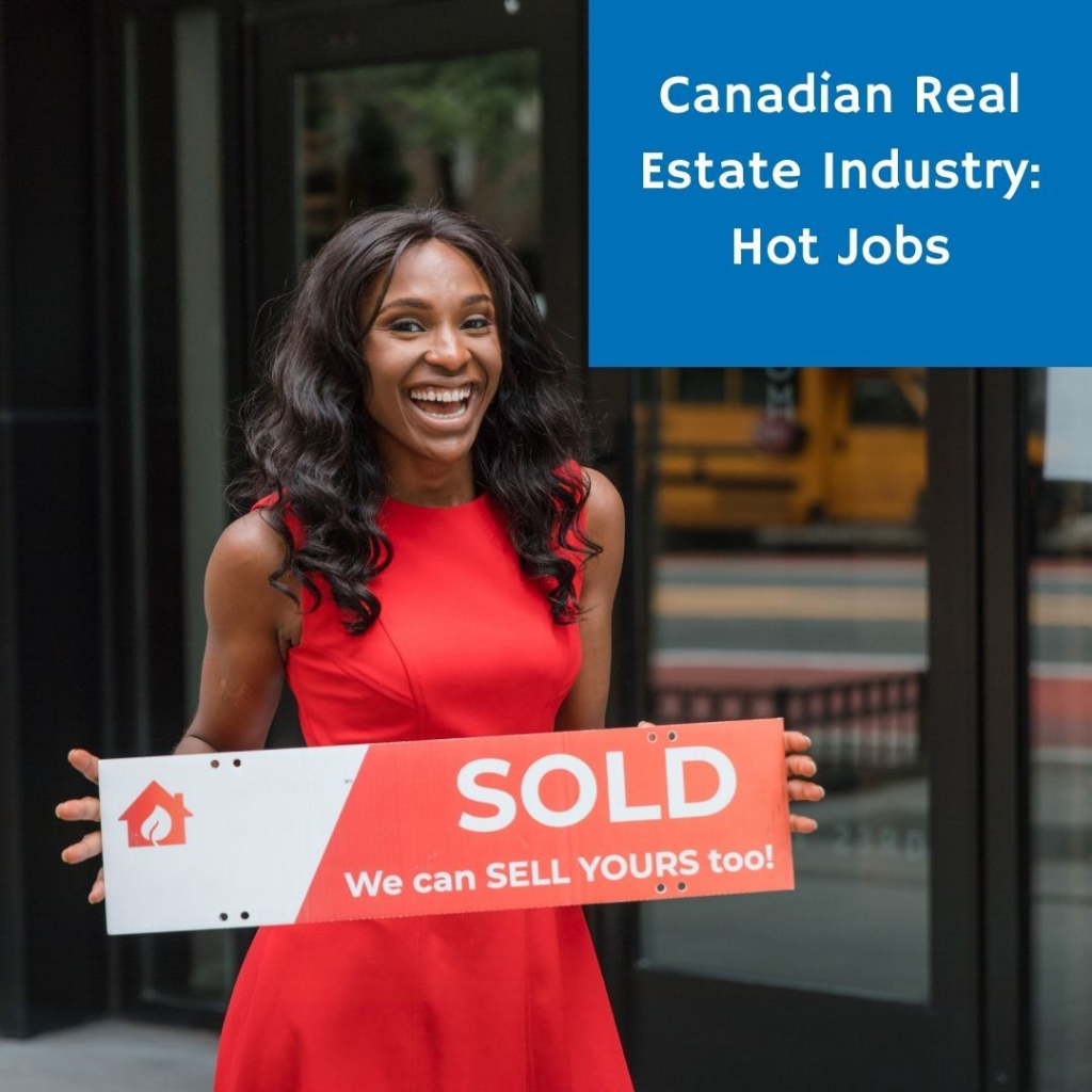A woman in a red dress holding a sold sign