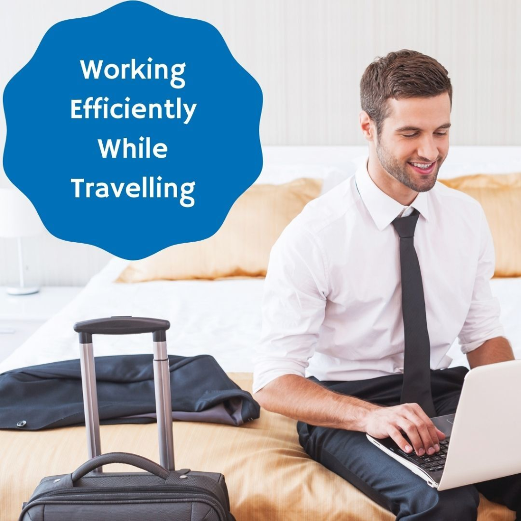 Man working on a laptop while travelling remotely